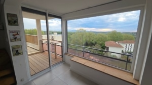 Coulissant Alizéa et châssis fixe aluminium Millet posés par Zabal Menuiseries à Saint-Pierre-d’Irube