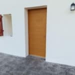 Rénovation de porte d’entrée bois Zilten par Zabal Menuiseries au Pays Basque
